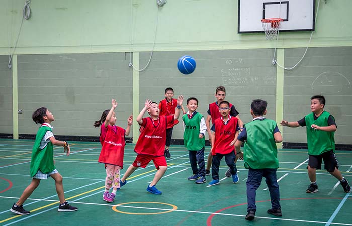 students-in-the-indoor-sporthall-shiplake-college