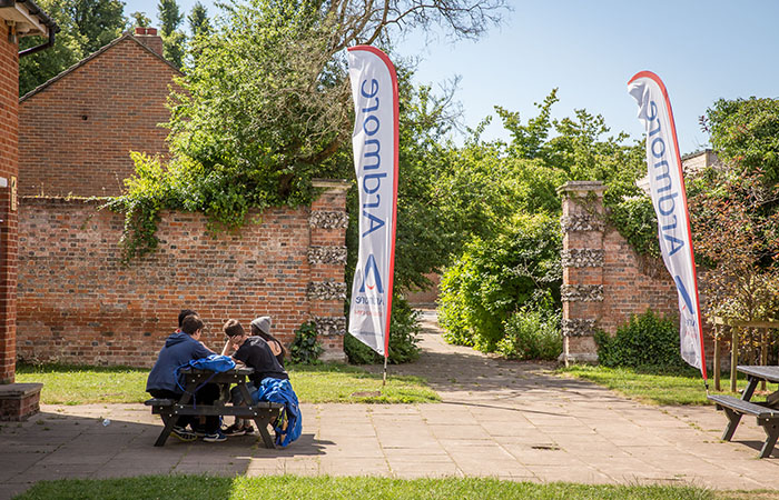 students-outside-accommodation-block-bca-college